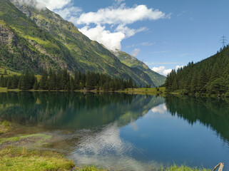 Fototapeta na wymiar Sunny summer morning on the Hintersee lake in Austrian Alps. Salzburg, Austria, Europe.