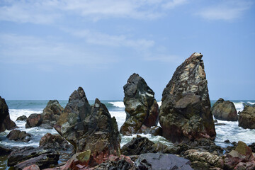 Ocean-Sea Waves, Mountains Rock Stones and Sky Blue Landscape Background