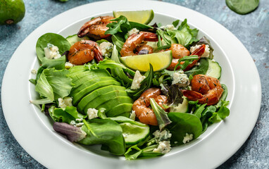 Seafood salad with avocado, blue cheese and smoked shrimps. Homemade vegetarian shrimp salad. top view