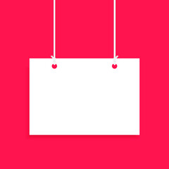 White hanging sign isolated on a red background