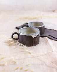 Modern serving with ceramic tableware on a light background top view