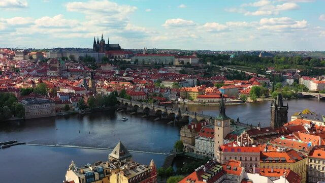 Prague scenic spring aerial view of the Prague Old Town pier architecture and Charles Bridge over Vltava river in Prague, Czechia. Old Town of Prague, Czech Republic.