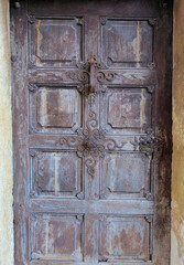 Old wooden door of the pilgrimage Church Maria Strassengel, a 14th century Gothic church in the town Judendorf Strassengel near Graz, Styria region, Austria