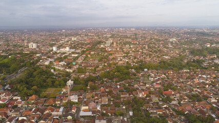 aerial view Yogyakarta with buildings and houses at sunset. urban environment in asia city skyline . cityscape cultural capital Indonesia yogyakarta located on java island, Indonesia