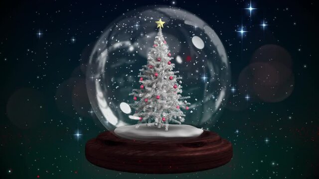 Red shooting star around christmas tree in a snow globe against shining stars on blue background