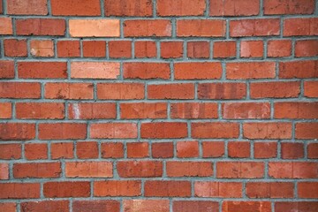 Red brick wall texture background material of industry construction.