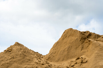 Coarse Sand pile and Find Granular Sand pile and fill Sand pile. used to make concrete  , to create  path , to create  floor. Sand texture , Sand  background and Sand isolated.