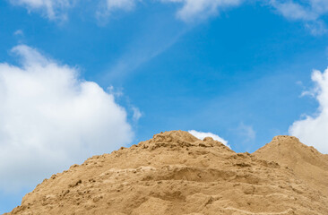 Coarse Sand pile and Find Granular Sand pile and fill Sand pile. used to make concrete  , to create  path , to create  floor. Sand texture , Sand  background and Sand isolated.