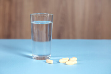 glass of water and drug