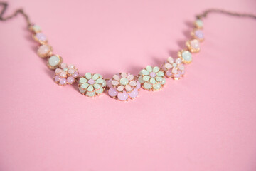 necklace on pink  background