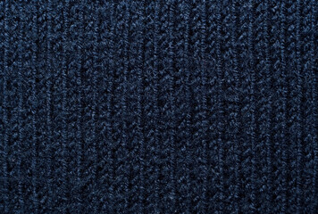 Knitted fabric background. Ornament. Close-Up knitted wool texture gray, blue