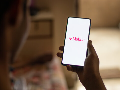 Assam, India - August 6, 2021 : T-Mobile logo on phone screen stock image.