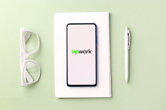 Assam, india - November 29, 2020 : Up work logo on phone screen stock image.