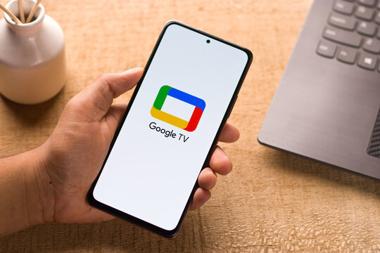 Assam, india - May 29, 2021 : Google Tv logo on phone screen stock image.