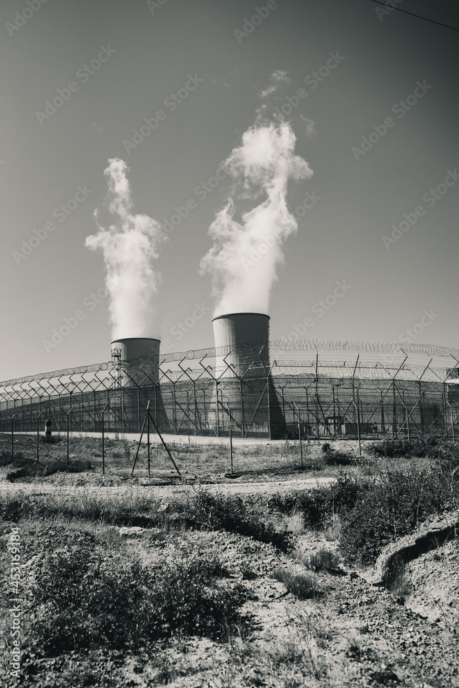 Canvas Prints Greyscale view of the factory working and smoke coming out of it