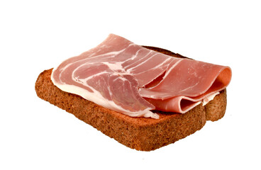 smoked prosciutto meat on toasted bread isolated on a white background