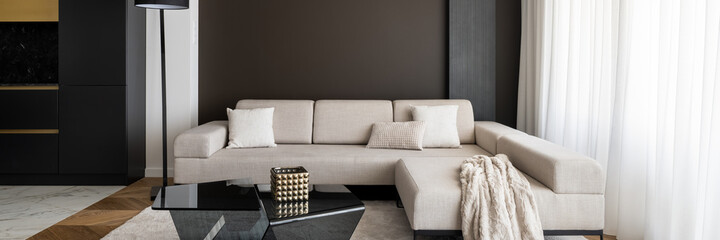 Elegant living room with big, corner sofa, panorama