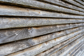 Wooden barn wall made of boards.