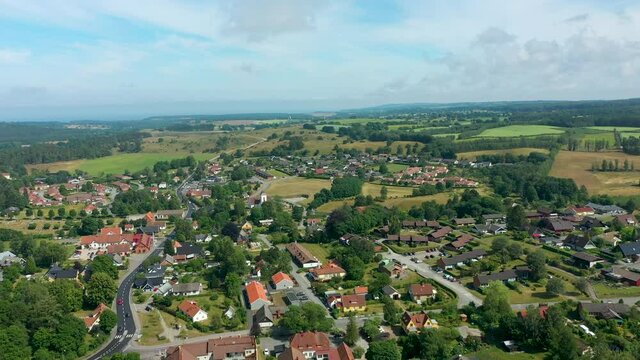 Br&ouml;sarps Backar, &Ouml;sterlen, Sk&aring;ne, Sweden. Aerial drone footage flying over the beautiful village.