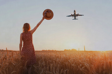 wanderlust travel concept, woman cheering airplane landing