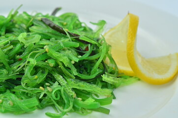 Bowl of Healthy Seaweed Salad on White plate