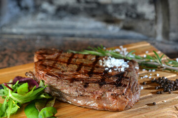 steak rib eye on cutting board close up