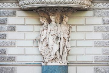 Angle of the building of 1875-1877, Three Maidens symbolizing fertility, art and navigation. Millionnaya Street and Mramorny Lane, St. Petersburg, Russia - 453180579