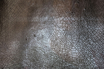 Cracked paint on an old painting, macro, craquelures