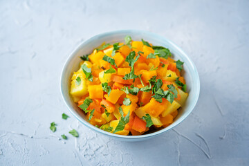 Pumpkin potato carrot stew in the bowl