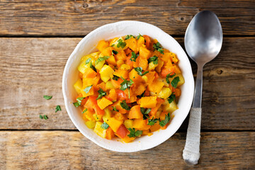 Pumpkin potato carrot stew in the bowl