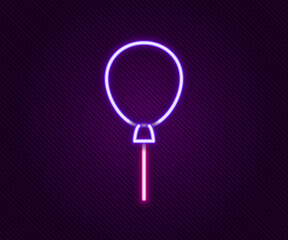 Glowing neon line Balloons with ribbon icon isolated on black background. Happy Easter. Colorful outline concept. Vector