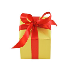 Golden gift wrapped present with red satin ribbon bow isolated on white