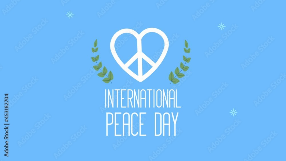 Wall mural international peace day lettering with heart and wreath