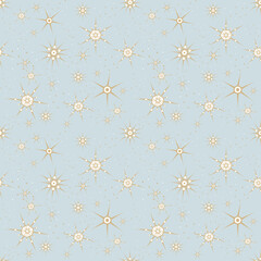 Vector seamless pattern. Winter light blue background of golden snowflakes of different shapes. Christmas festive texture for design of cards, posters, holiday invitations, winter decor