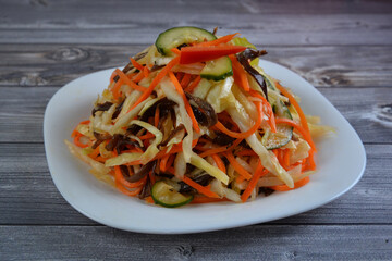 Korean Salad food pickle on white plate closeup top view
