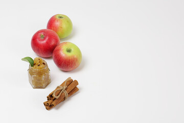 apple with cinnamon and apple jam on white background
