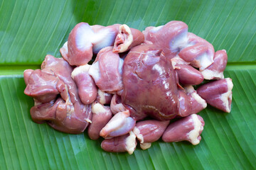 Mixed chicken entrails on banana leaf