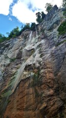 Waterfall Skakavac and green rocks behind it, Sarajevo, Bosnia and Herzegovina