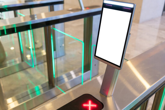 close up view of turnstile with facial identify device.