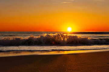 Fototapeta na wymiar Beautiful sunrise at the sea beach