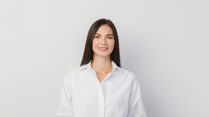 A young woman portrait isolated against a solid white background