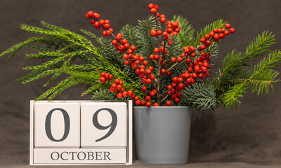 Memory and important date October 9, desk calendar - autumn season.