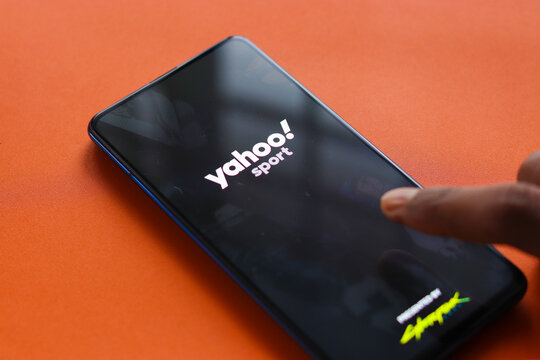 Assam, india - January 31, 2021 : Yahoo sports logo on phone screen stock image.