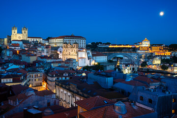 Fototapeta premium Famous view of Porto by night with moon,