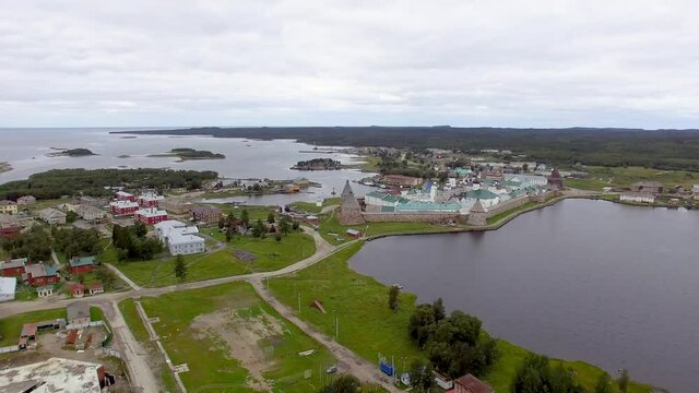 Solovki Russia kremlin aerial drone footage, tourism of north White Sea, left span to bay 4K