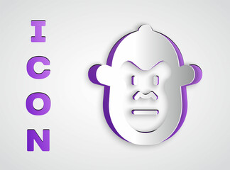 Obraz premium Paper cut Monkey icon isolated on grey background. Animal symbol. Paper art style. Vector
