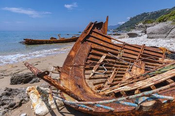 Shipwreck in Agios Gordios holiday resort village on west coast of Corfu Island, Greece