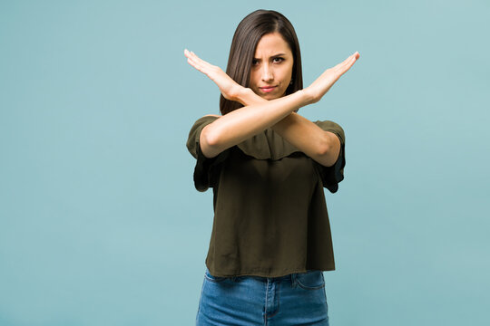 Angry Woman Blocking Someone