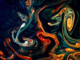 Colorful abstract texture with acrylic paint in motion.