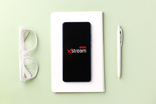 Assam, india - November 29, 2020 : Airtel xstream logo on phone screen stock image.